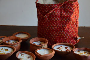 Festive Gift Bag with 10 assorted terracotta diyas | Red Bag